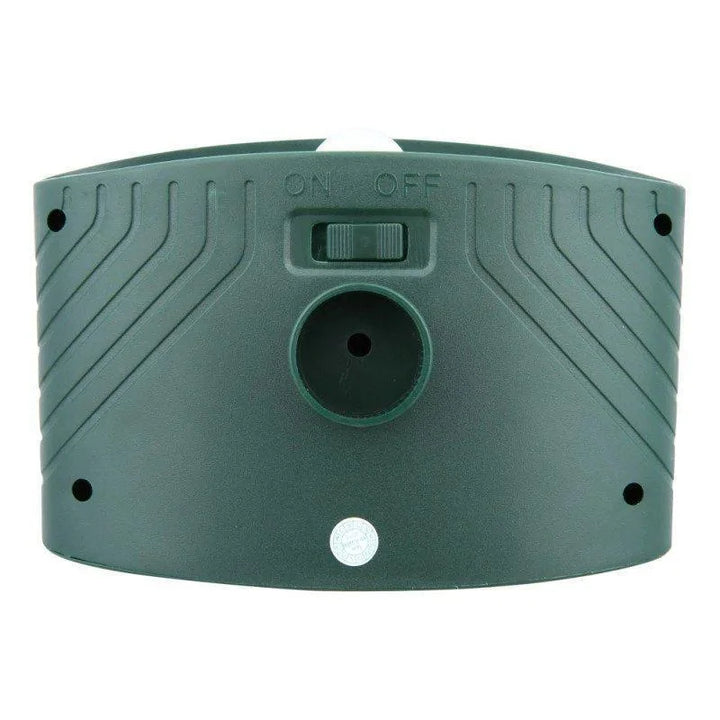 Solar-powered ultrasonic deer repeller with green casing, motion sensor, solar panel, ideal for outdoor garden protection.