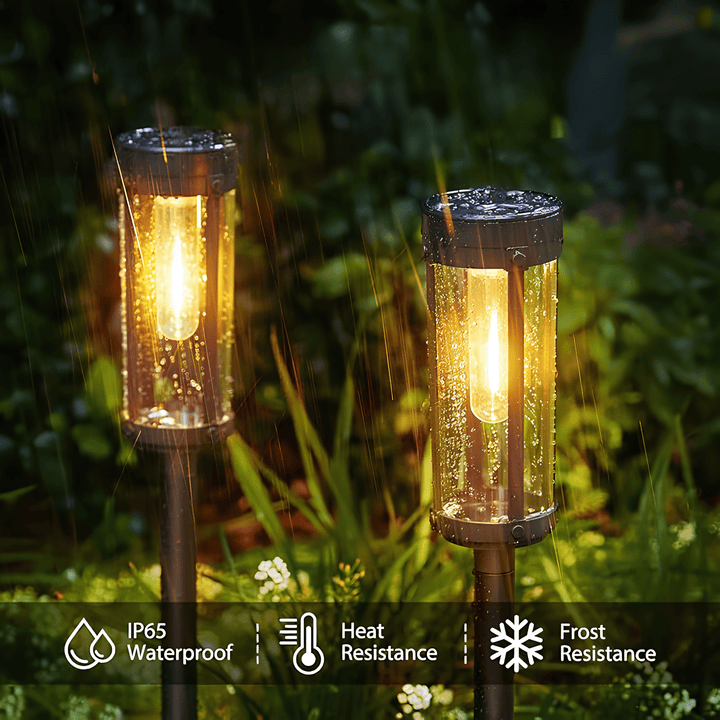 Solar-powered waterproof garden torch with flickering glow, decorative design, illuminating gardens, patios, and pathways.