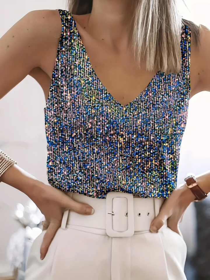 Sparkly sleeveless women's sequin party top, glittering design catches light; perfect for festive evenings, flattering fit.