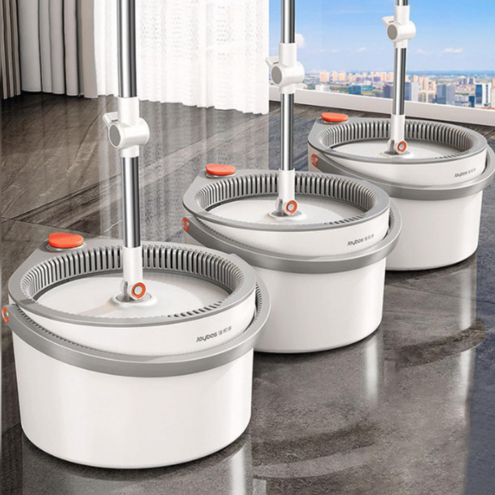 "SpinMop with self-cleaning microfiber, ergonomic handle, efficient 360° rotation, for spotless floors and easy cleaning."