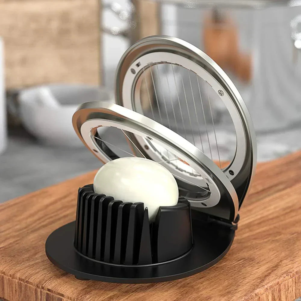 Stainless Steel 3-in-1 Egg Slicer with durable wires, ergonomic design; slices eggs, mushrooms, fruits easily for top present
