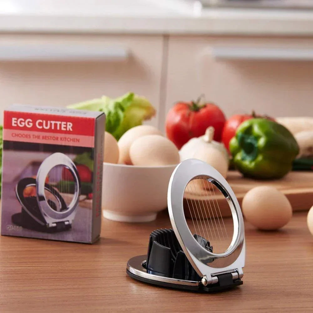 Stainless Steel 3-in-1 Egg Slicer with durable wires, ergonomic design; slices eggs, mushrooms, fruits easily for top present