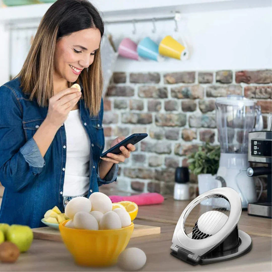 Stainless Steel 3-in-1 Egg Slicer with durable wires, ergonomic design; slices eggs, mushrooms, fruits easily for top present