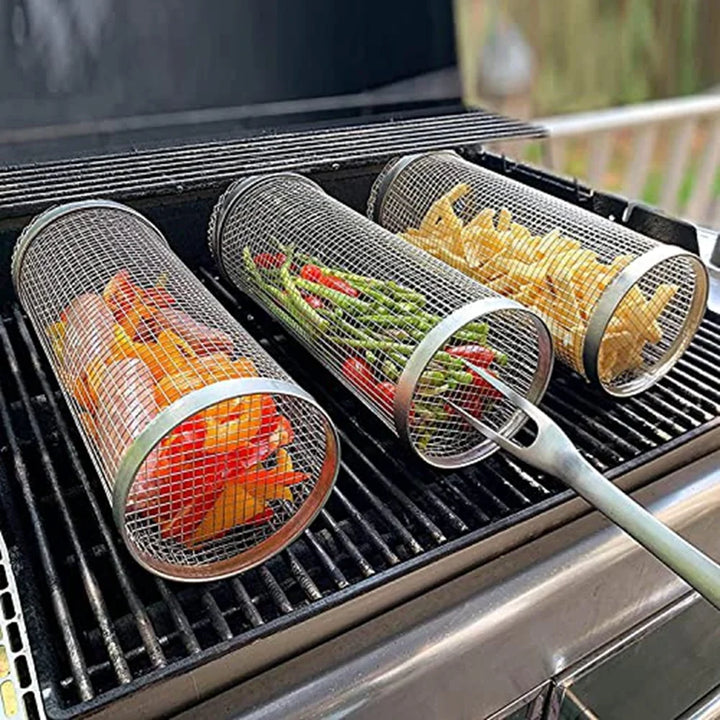 "Stainless steel BBQ rolling basket with mesh design for even grilling, shown with food; essential for outdoor cooking."
