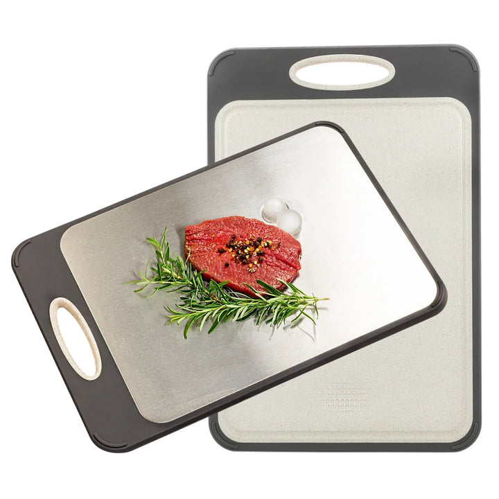 Stainless steel cutting board with a smooth finish and non-slip ergonomic handle, ideal for precise and hygienic kitchen prep