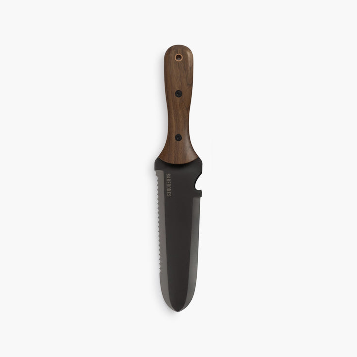 "Stainless steel Hori Hori garden tool with ergonomic walnut handle for digging and weeding in gardens."
