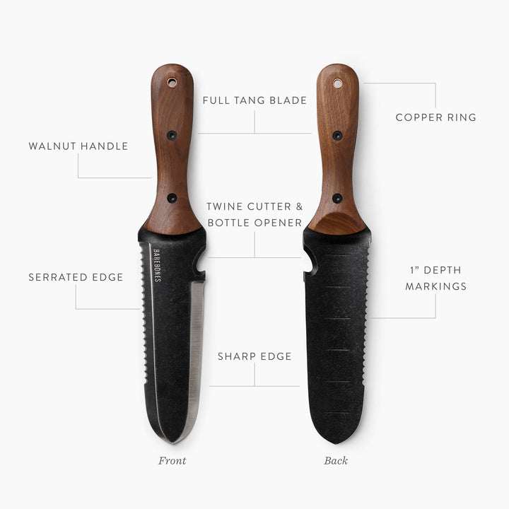 "Stainless steel Hori Hori garden tool with ergonomic walnut handle for digging and weeding in gardens."