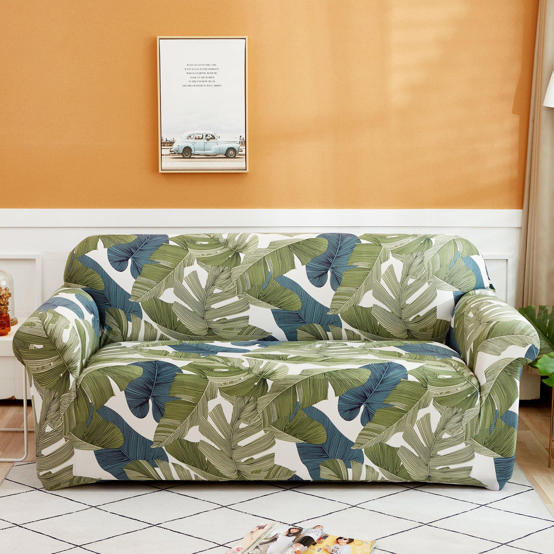"Stretchy Split Leaf sofa cover with nature-inspired pattern fits various sofas, adds style, and offers protection against sp