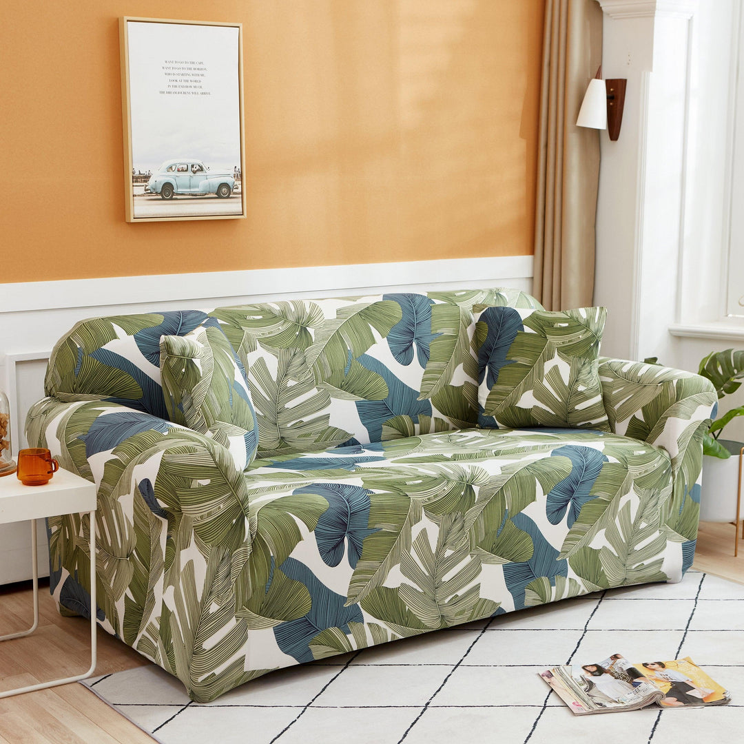 "Stretchy Split Leaf sofa cover with nature-inspired pattern fits various sofas, adds style, and offers protection against sp