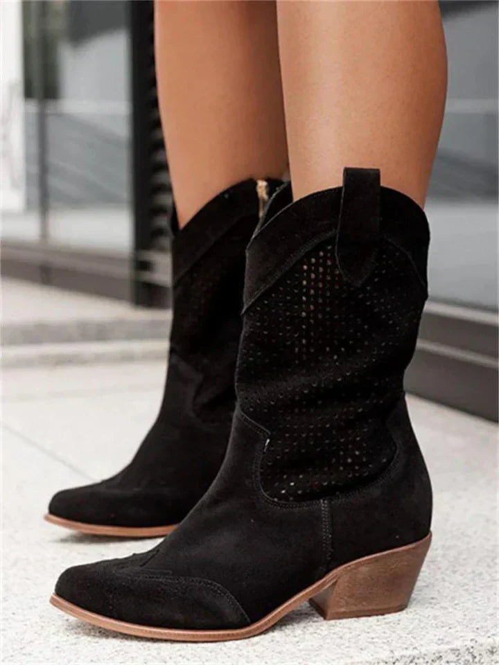 Stylish women's leather cowboy boots with intricate stitching and sleek silhouette enhance any look with a classic Western vi
