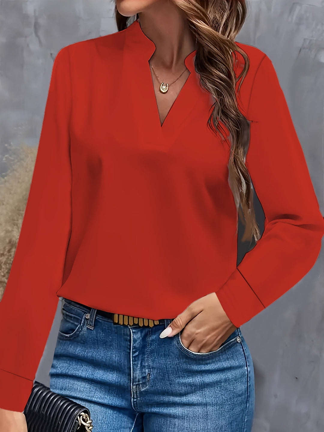"Stylish women's V-neck blouse, light flowy fit, flattering silhouette, versatile for casual or formal occasions."