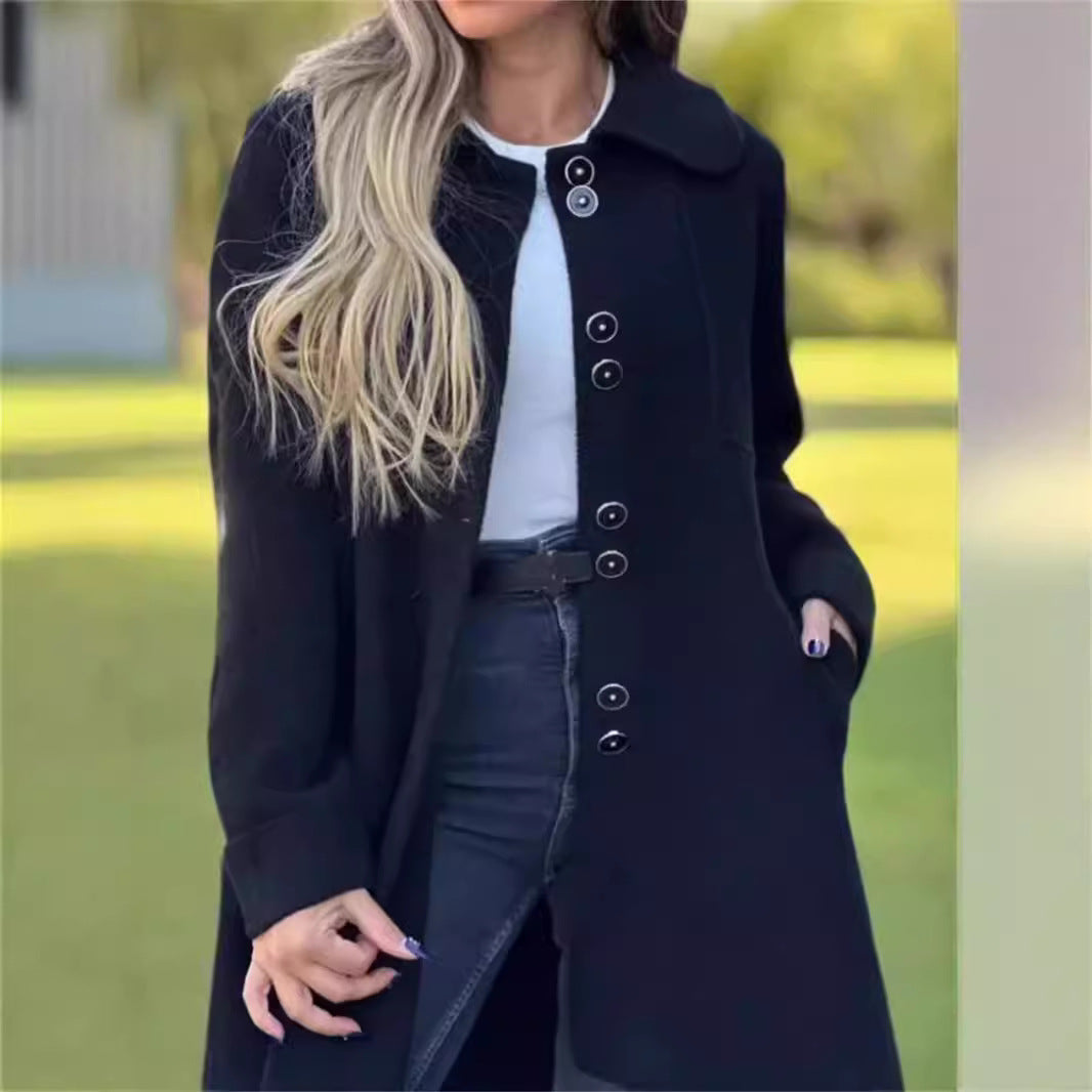Tailored women's coat with structured silhouette, thigh-length, single-breasted, ideal for business casual wear.