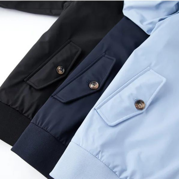 "Tartan-lined Harrington jacket with ribbed cuffs and hem, featuring classic side view. Men's Camden Heritage style."