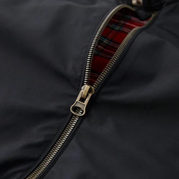"Tartan-lined Harrington jacket with ribbed cuffs and hem, featuring classic side view. Men's Camden Heritage style."