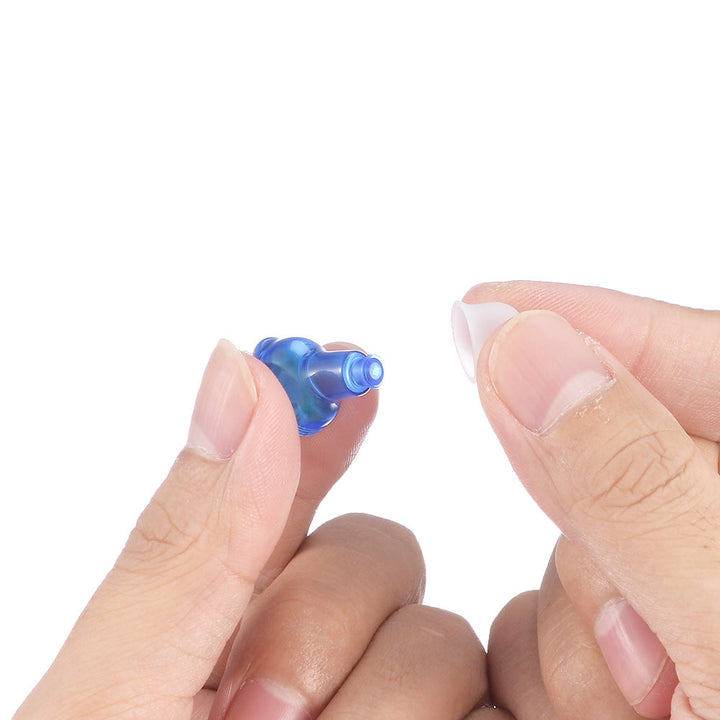 "Ultra-discreet rechargeable invisible hearing aids, sleek blue and red design, perfect for enhanced auditory clarity."