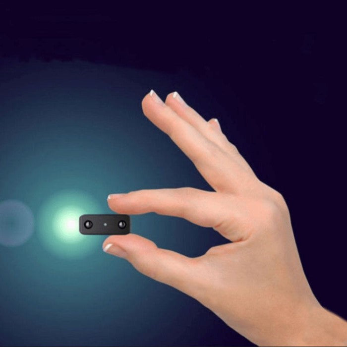 "Ultra-small micro HD video camera with motion detection, compact and sleek for discreet home monitoring."