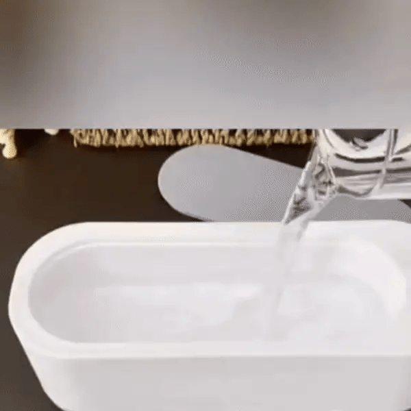 "Ultrasonic cleaning device restoring shine to jewellery, glasses, watches with advanced sound wave technology."