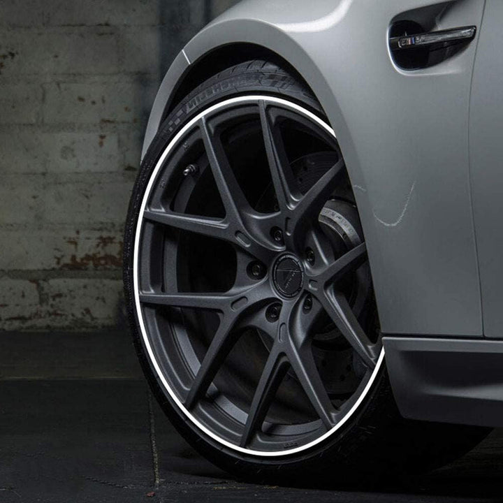 "Unisex alloy wheel rim protector, high adhesion, prevents kerb scrapes, vibrant colors, DIY installation, durable rubber."