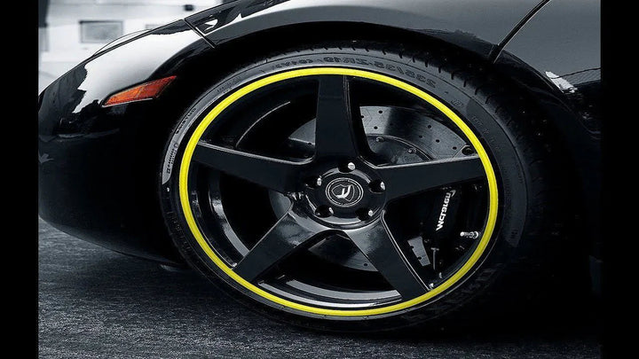 "Unisex alloy wheel rim protector, high adhesion, prevents kerb scrapes, vibrant colors, DIY installation, durable rubber."