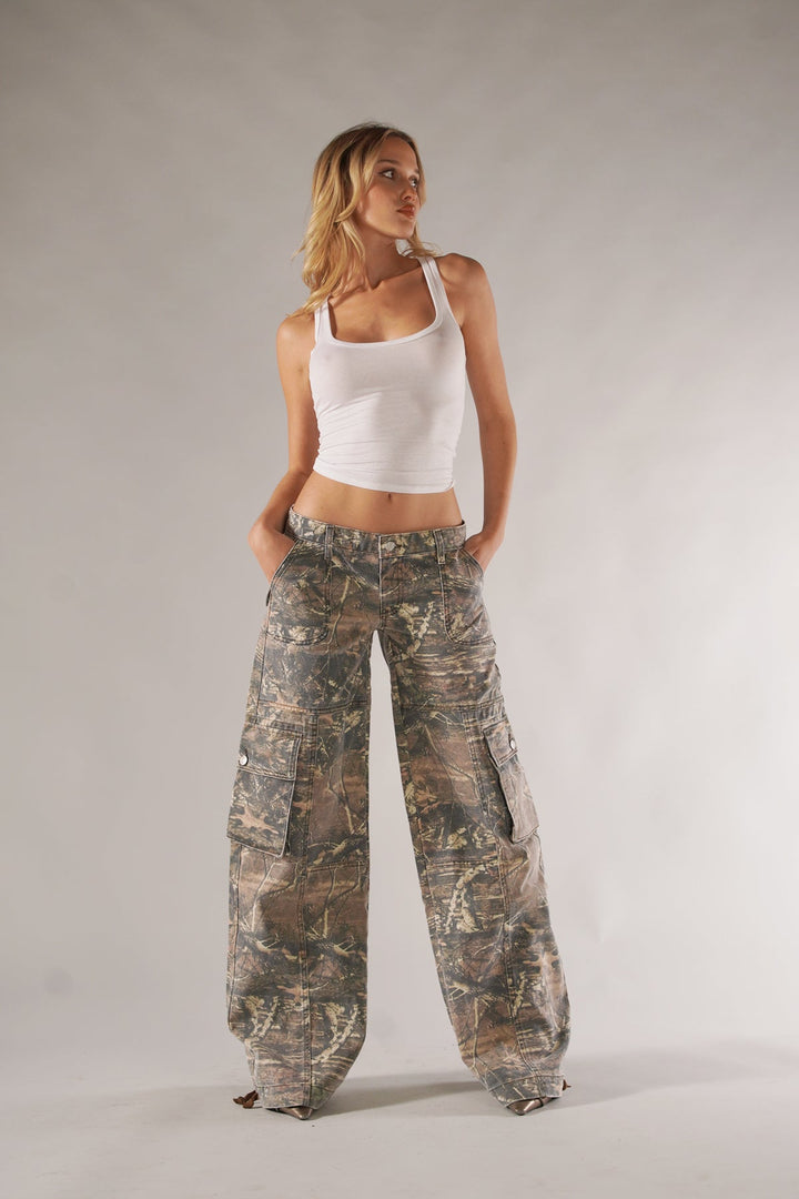 Unisex camo cargo pants with rugged utility pockets, featuring a relaxed fit and bold camo print for urban or outdoor style.