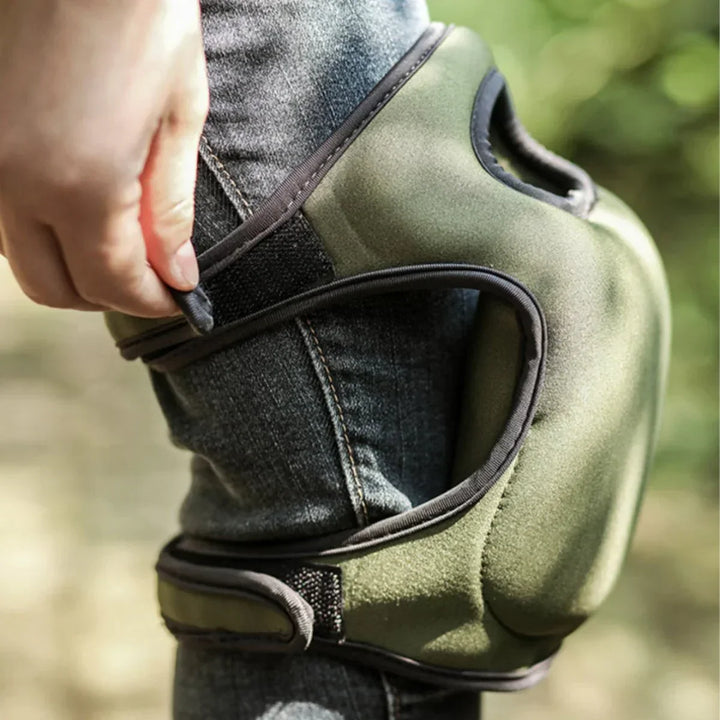 Unisex ergonomic gardening knee pads with thick cushioning on green grass, offering comfort and support for kneeling tasks.