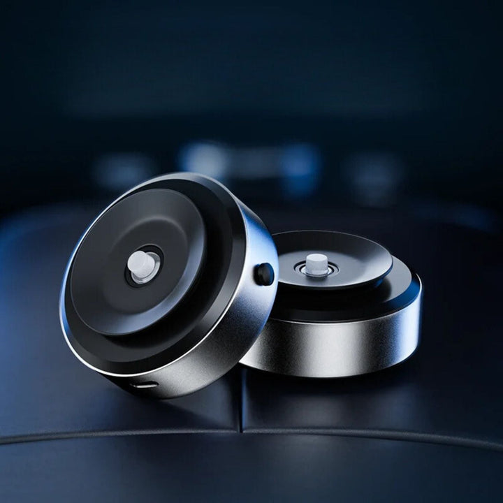 "Universal magnetic car phone holder with suction base, sleek black design, strong grip, adjustable for optimal view."