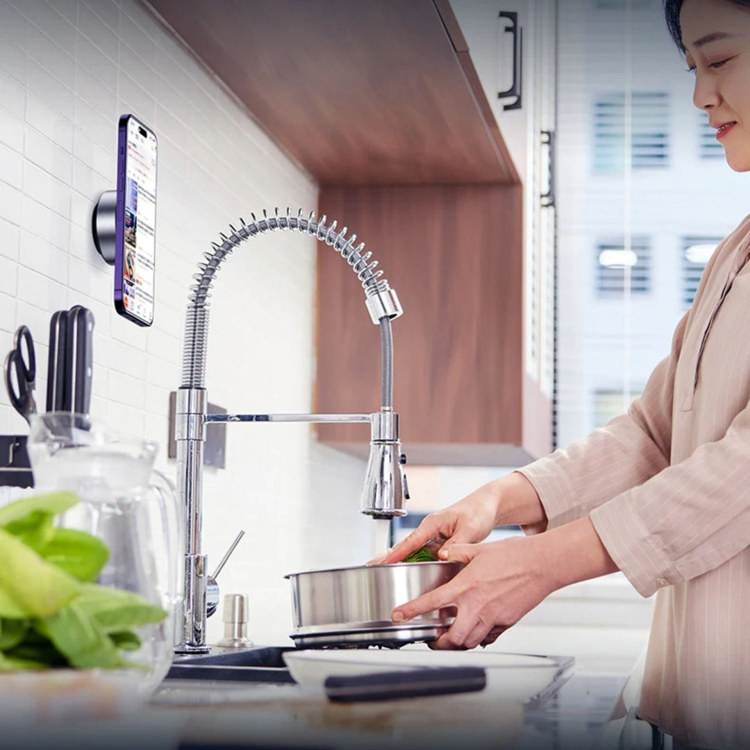 "Universal magnetic car phone holder with suction base, sleek black design, strong grip, adjustable for optimal view."