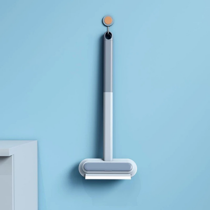 "Universal pet hair remover multi-surface cleaner, handheld tool with ergonomic grip, removes fur from clothes, furniture."