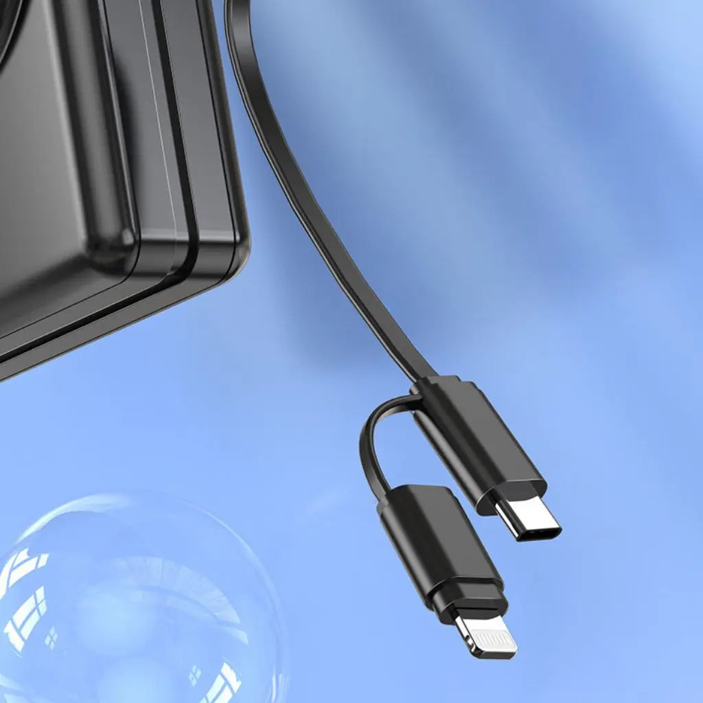 "Universal power bank 20000mAh with built-in cables, USB-C, lightning connectors, compact design, ideal for travel."