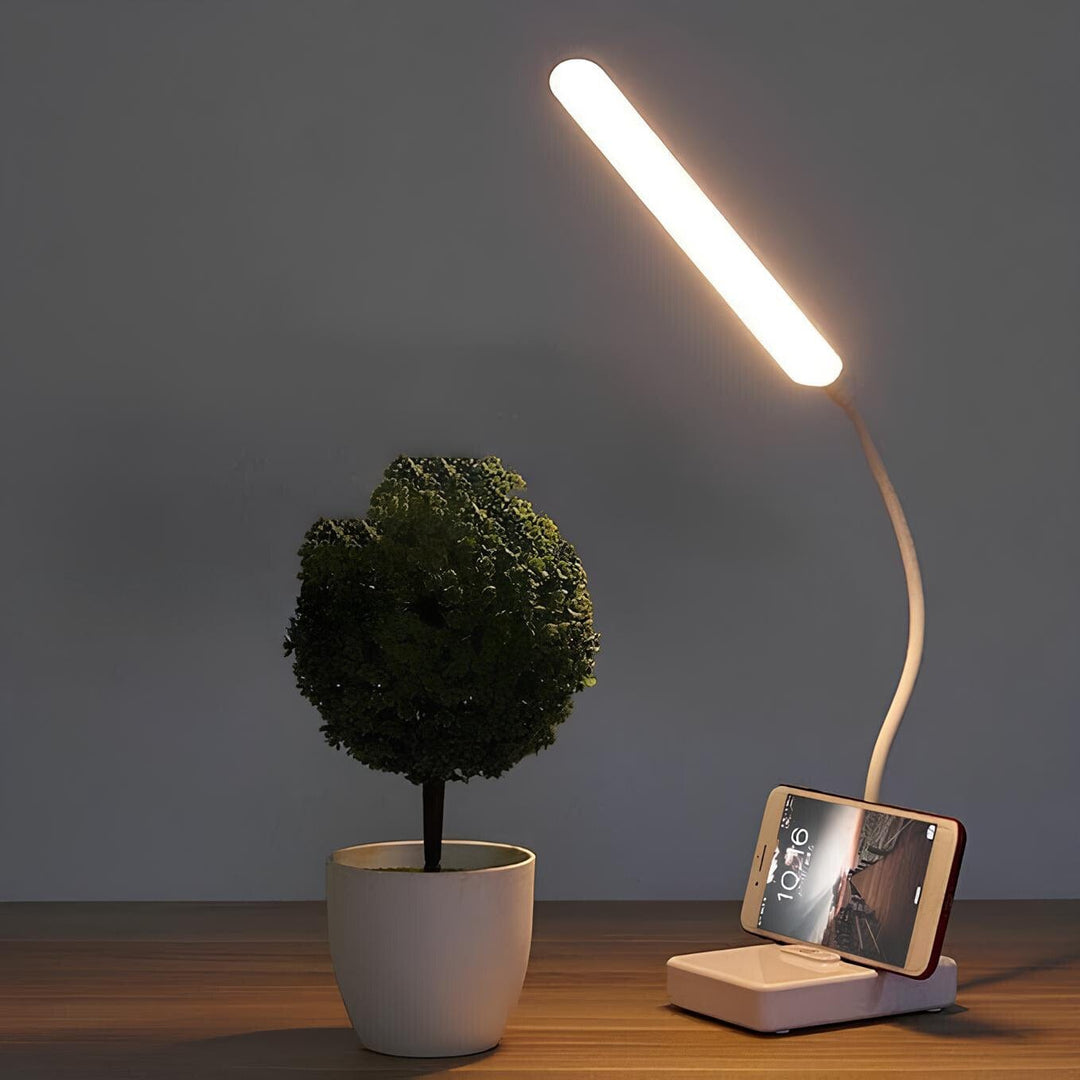 "USB rechargeable flexible arm desk lamp with adjustable neck, dimmable brightness, and three light color options."