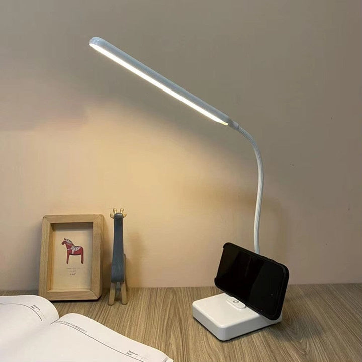 "USB rechargeable flexible arm desk lamp with adjustable neck, dimmable brightness, and three light color options."