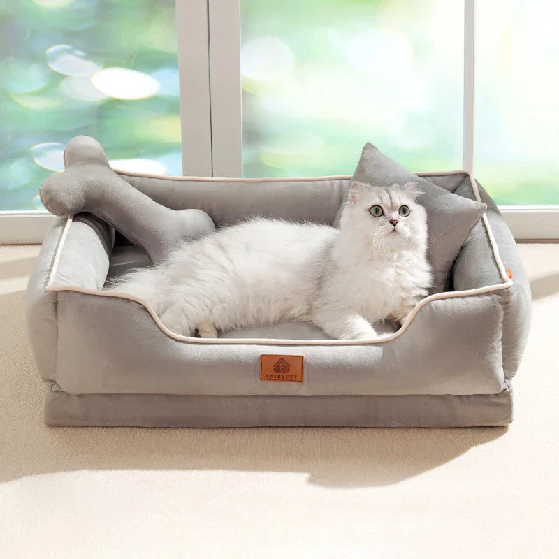 "Velvet-soft pet bed with cushion and bolster, shown in modern living room, offers comfort with Dutch velvet texture."