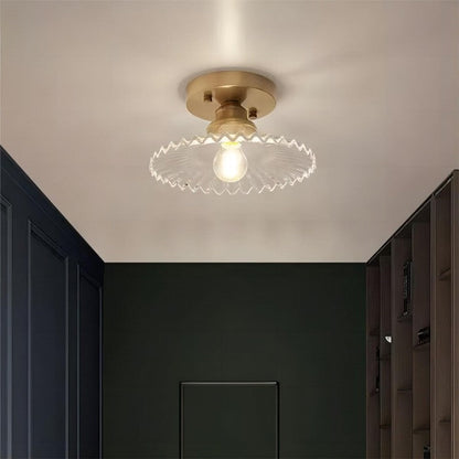 "Vintage glass ceiling lamp with ribbed petals in green and clear finish, elegant and timeless for home lighting decor."