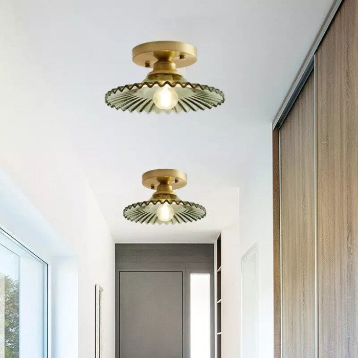 "Vintage glass ceiling lamp with ribbed petals in green and clear finish, elegant and timeless for home lighting decor."
