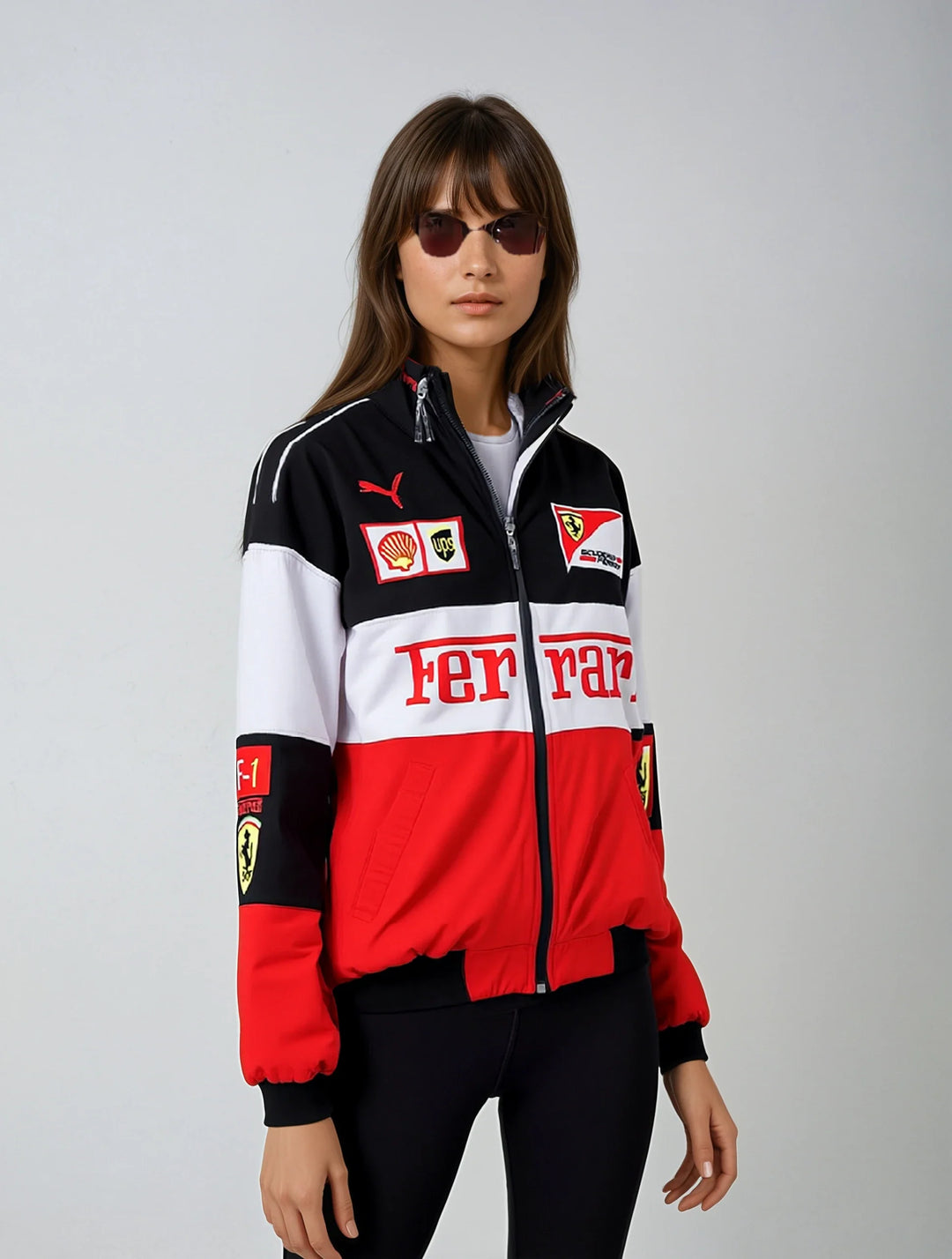 Vintage unisex racing jacket with bold Ferrari logo, available in black, red, and white-red; combines style and comfort.