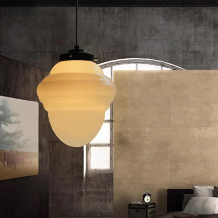 "Vintage white milk glass pendant light with geometric jar design in pristine white, perfect for various decor styles."