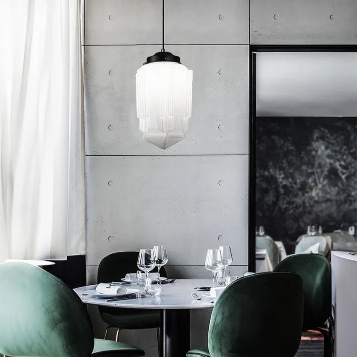 "Vintage white milk glass pendant light with geometric jar design in pristine white, perfect for various decor styles."