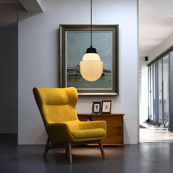 "Vintage white milk glass pendant light with geometric jar design in pristine white, perfect for various decor styles."