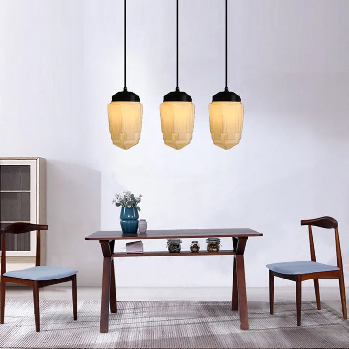 "Vintage white milk glass pendant light with geometric jar design in pristine white, perfect for various decor styles."