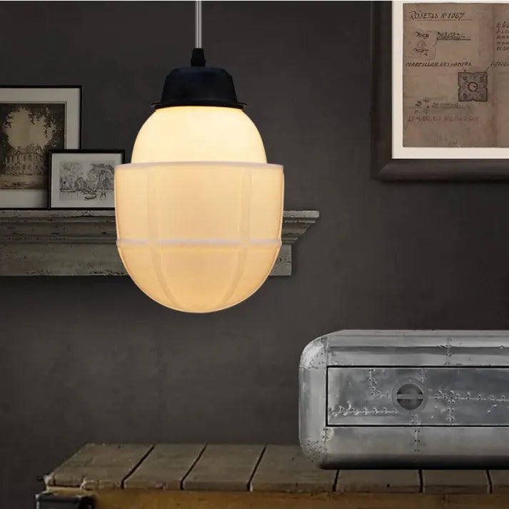 "Vintage white milk glass pendant light with geometric jar design in pristine white, perfect for various decor styles."