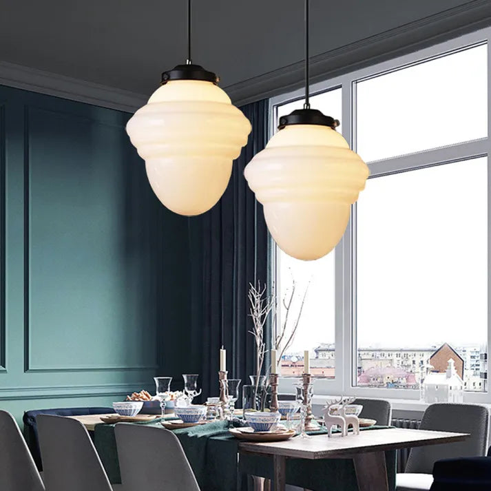 "Vintage white milk glass pendant light with geometric jar design in pristine white, perfect for various decor styles."