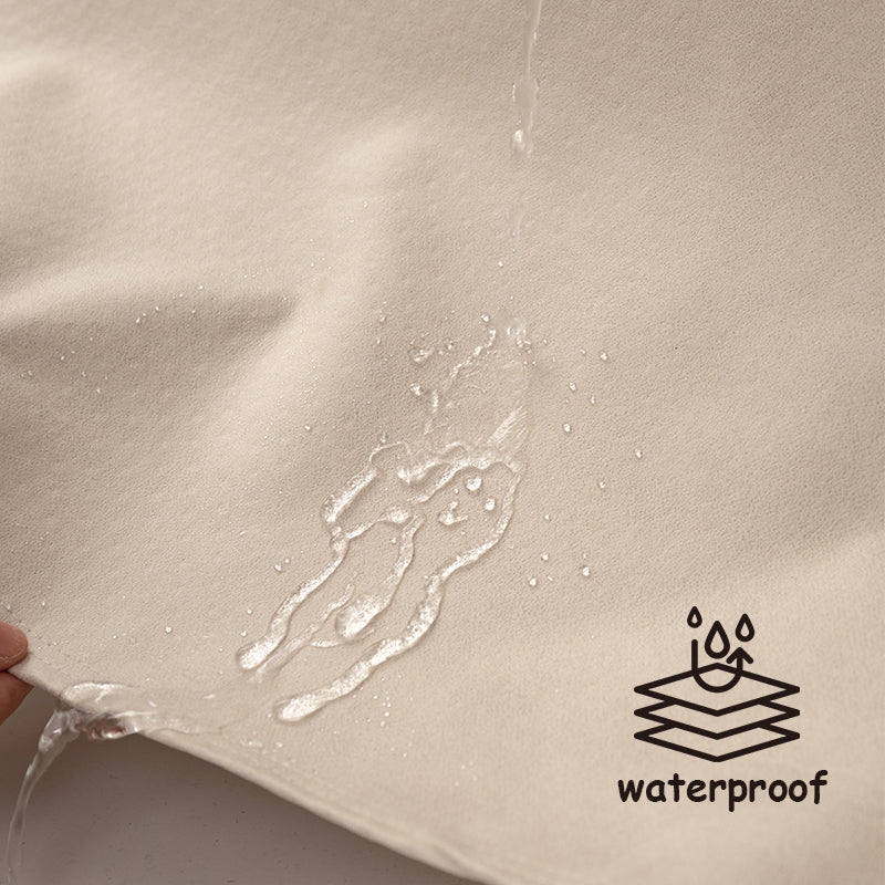 "Waterproof anti-scratch sofa cover in beige, ideal for pet owners, showcasing durable fabric and anti-slip backing."