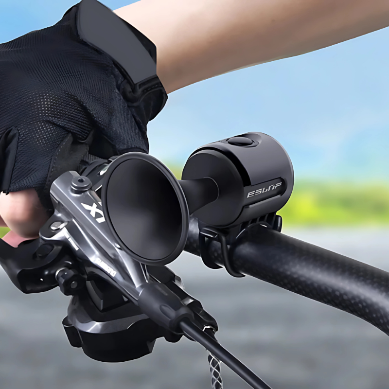 "Waterproof bike horn with sleek design, 120dB blast for maximum safety, available in black, blue, and red, ideal for cyclist