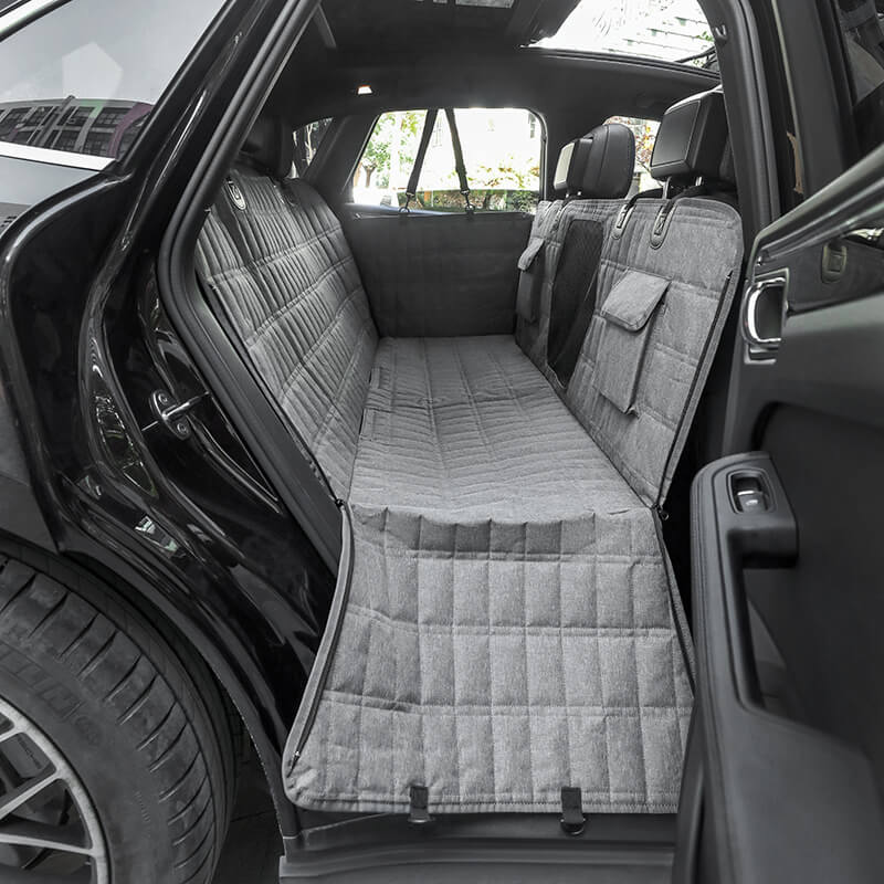 "Waterproof dog car seat cover with mesh window, black, universal fit, breathable and durable for comfortable pet travel."