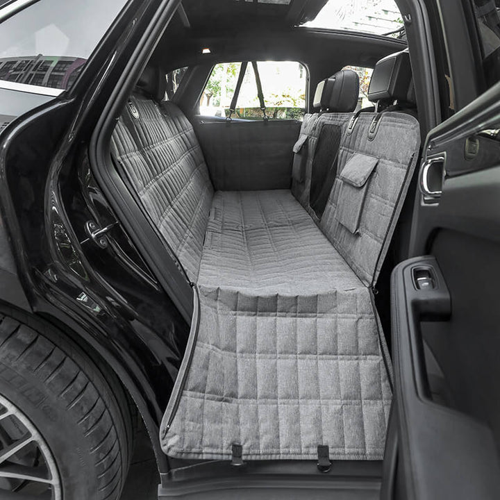 "Waterproof dog car seat cover with mesh window, black, universal fit, breathable and durable for comfortable pet travel."