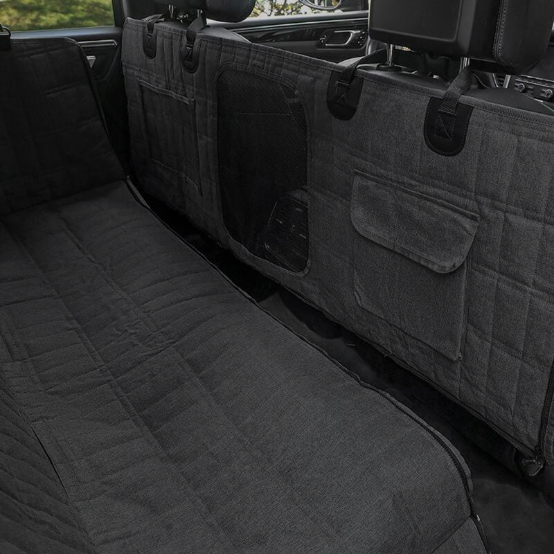 "Waterproof dog car seat cover with mesh window, black, universal fit, breathable and durable for comfortable pet travel."