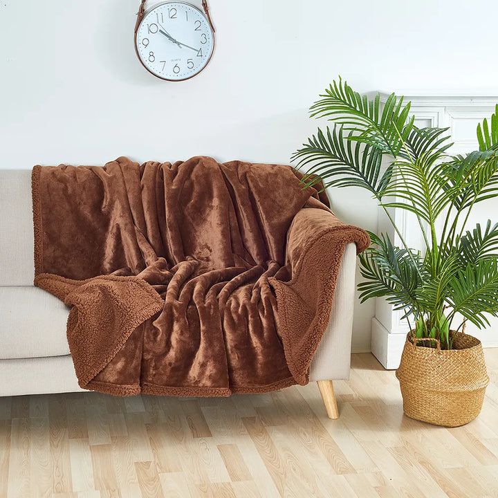 "Waterproof plush furniture protector, dual-sided, fits all sizes; soft, cozy, protects from spills and stains."
