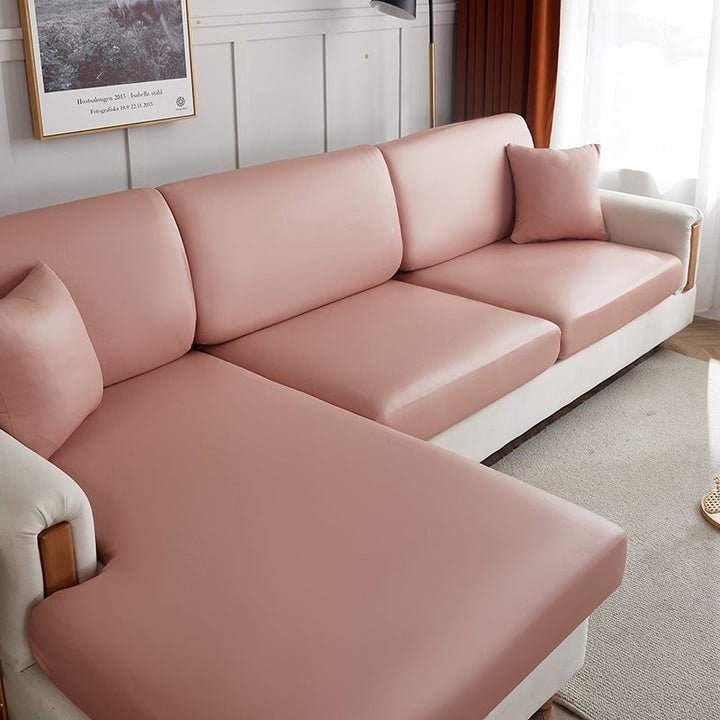 "Waterproof sectional sofa cover in smoke grey, sleek design for leather protection, durable stretchable fabric, snug fit."