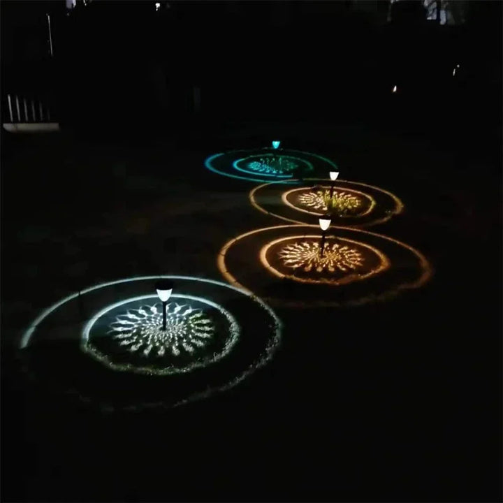 Weatherproof garden light casting intricate mandala shadows, solar-powered, LED, IP65 waterproof, enhances outdoor decor.