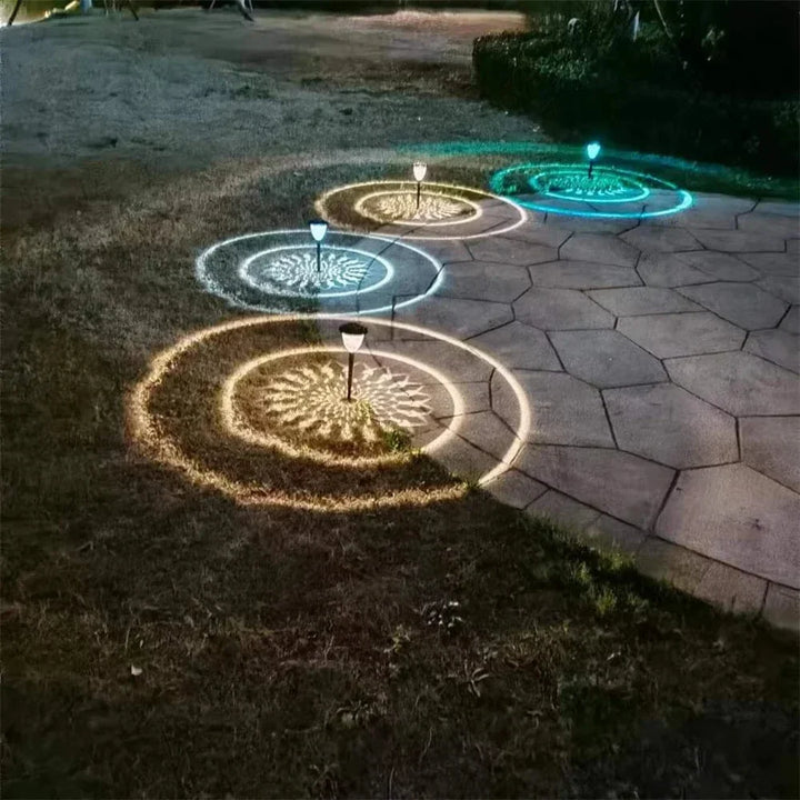 Weatherproof garden light casting intricate mandala shadows, solar-powered, LED, IP65 waterproof, enhances outdoor decor.
